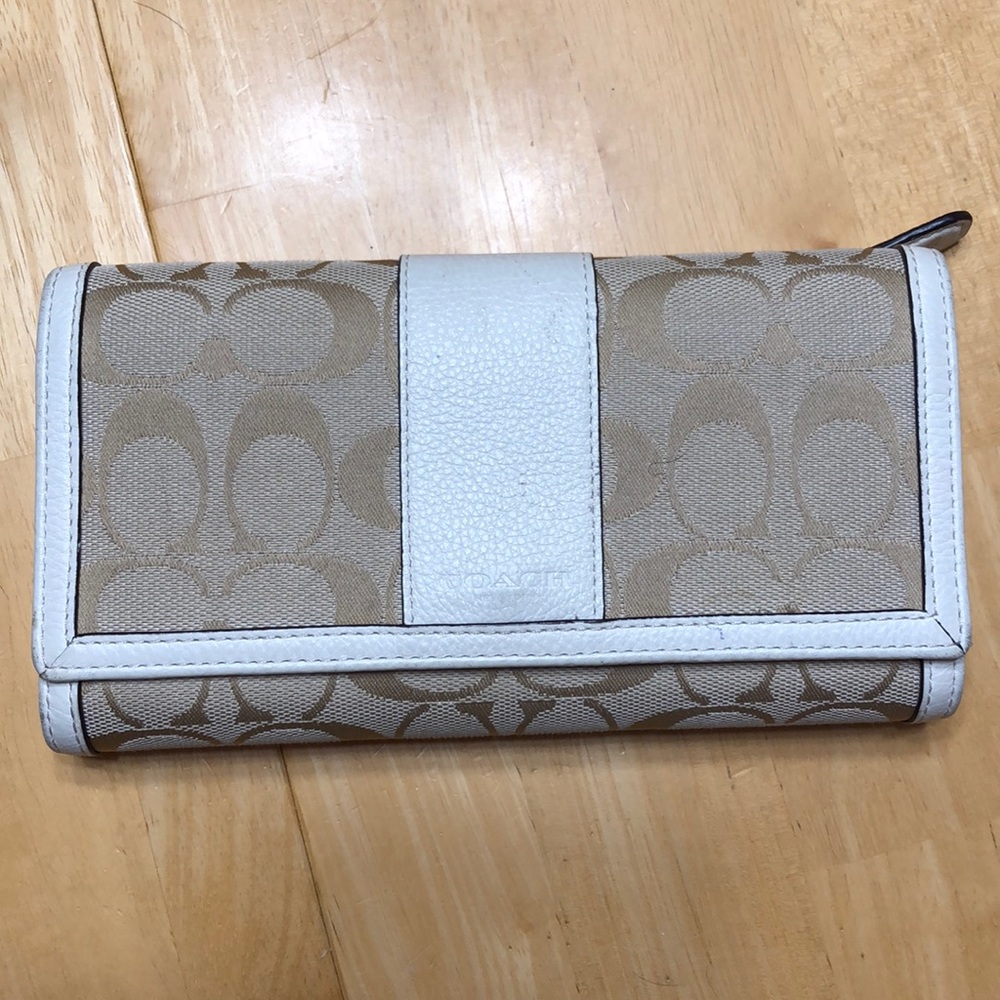 Coach trifold wallet with check holder.